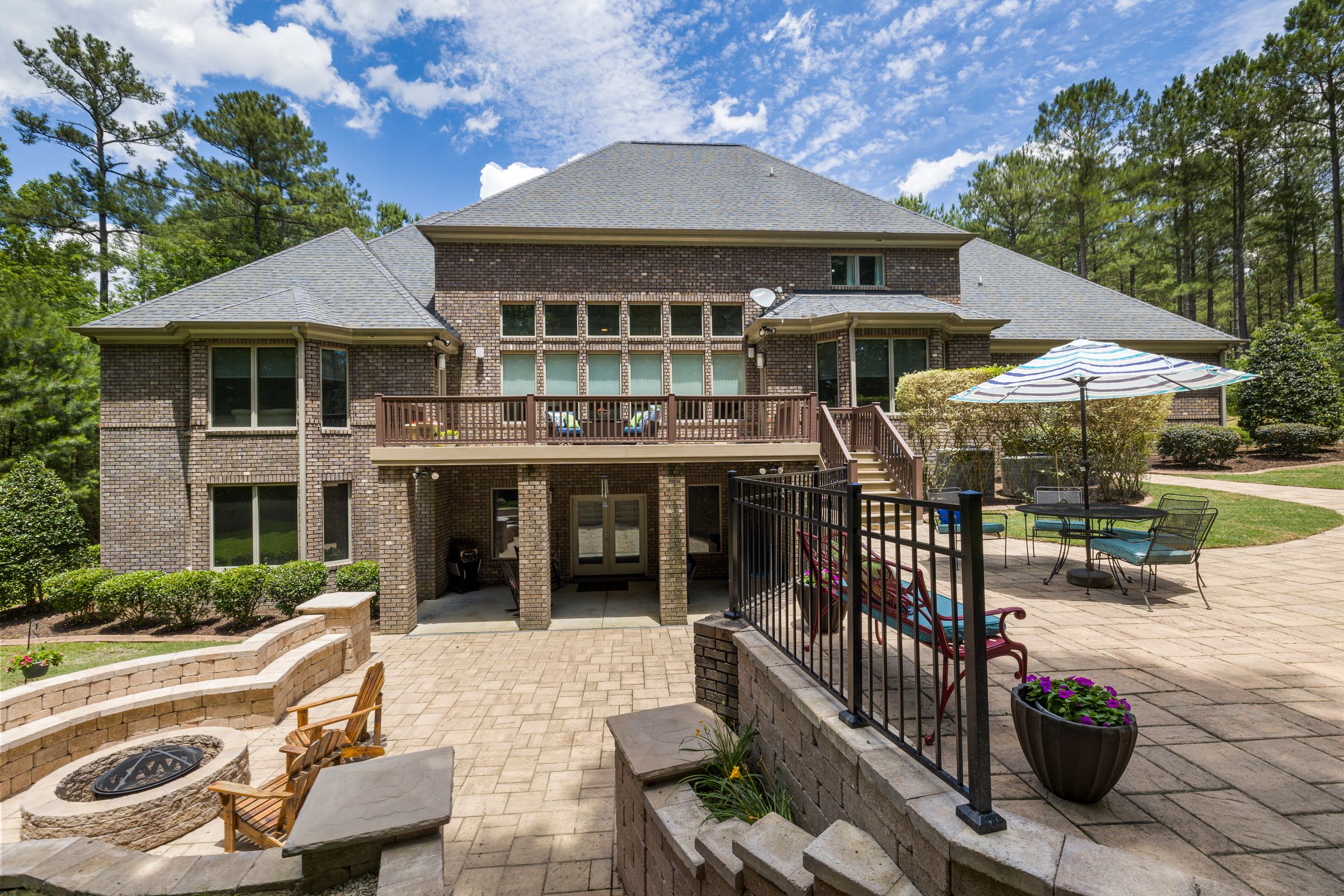 Paver patio with block seat walls and a fire pit